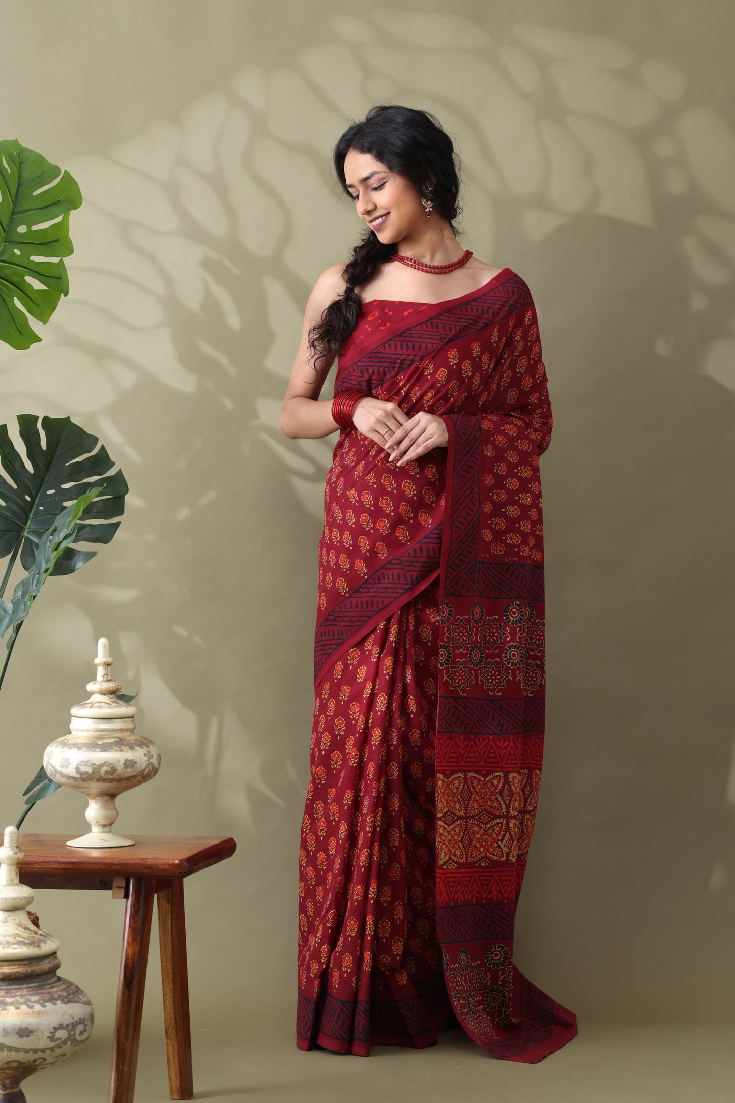 Navya Wine Red Floral Motif Cotton Saree.