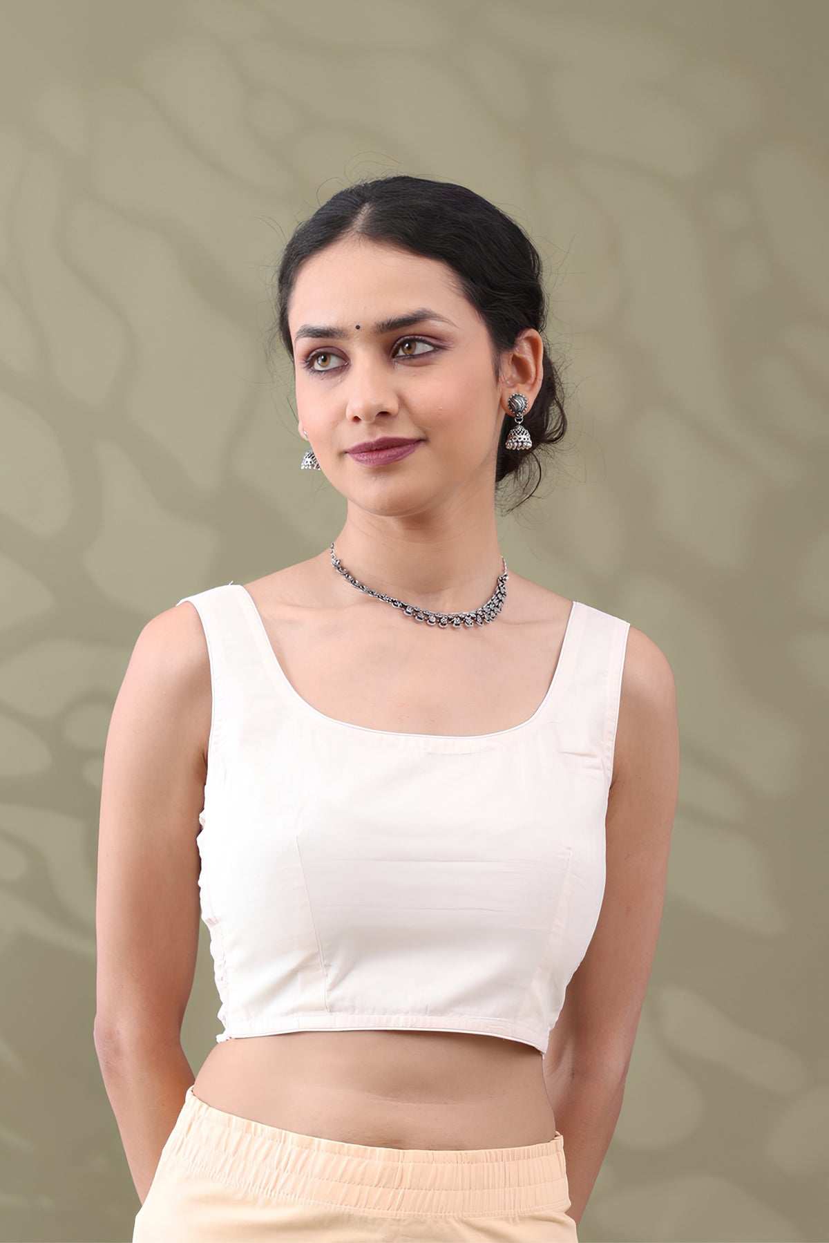 Navya Cream Basic cotton Sleeveless Blouse