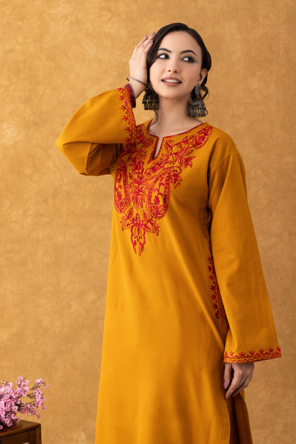 mustard colour pheran, mustard pheran, mustard colour embroidery, mustard yellow embroidered fabric, mustard with red suit set, mustard with red suit set party wear, women mustard with red suit set, mustard with red suit set ladies, mustard with red suit set online, winter suits, winter suits for women, kashmiri winter suits for ladies, kashmiri winter suits for ladies with price, winter suits unstitched, winter woolen suits for ladies with price, unstitched winter suits for ladies