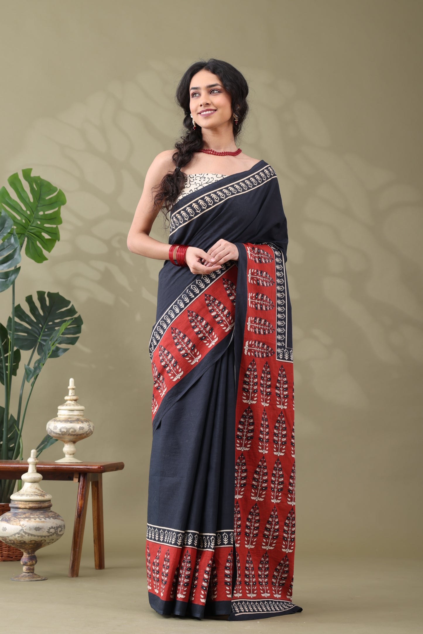 Navya Black Rust Border Cotton Saree.