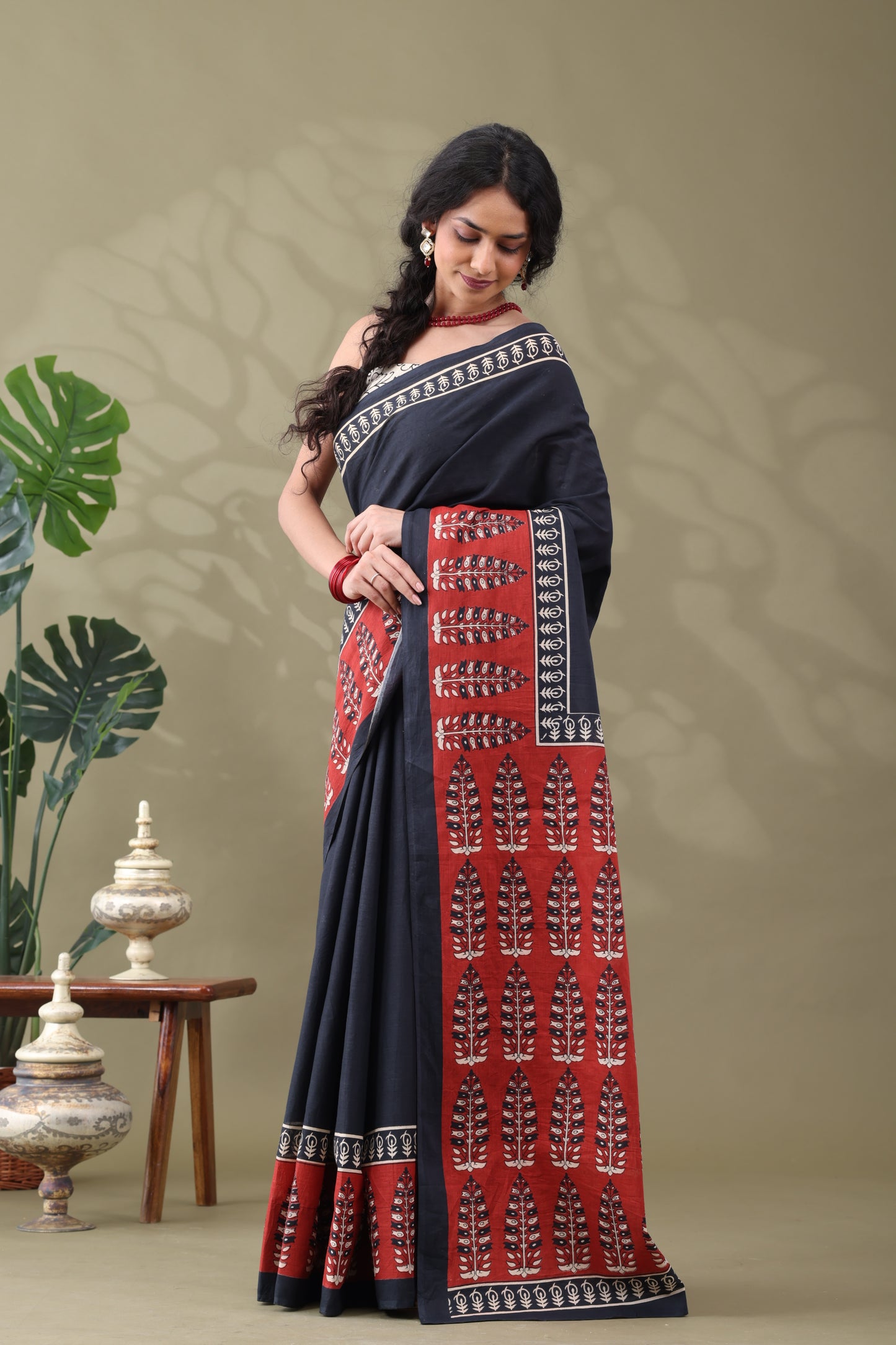 Navya Black Rust Border Cotton Saree.