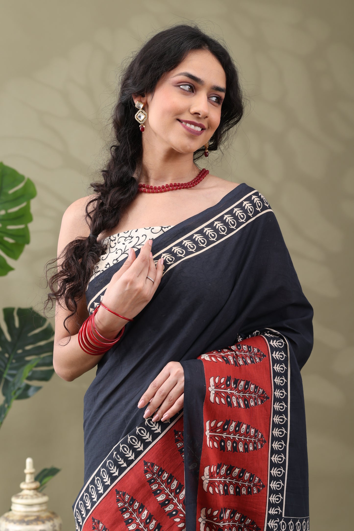 Navya Black Rust Border Cotton Saree.