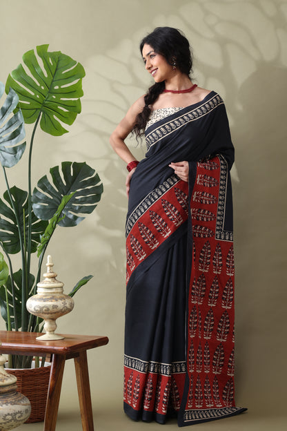 Navya Black Rust Border Cotton Saree.