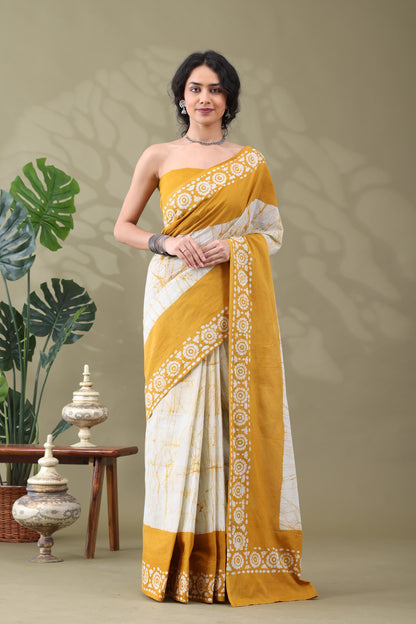 Navya Mustard Cream Batik Cotton Saree.