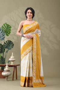 Navya Mustard Cream Batik Cotton Saree.