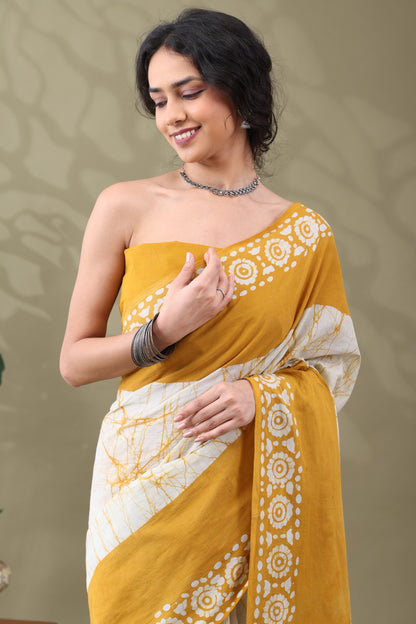 Navya Mustard Cream Batik Cotton Saree.