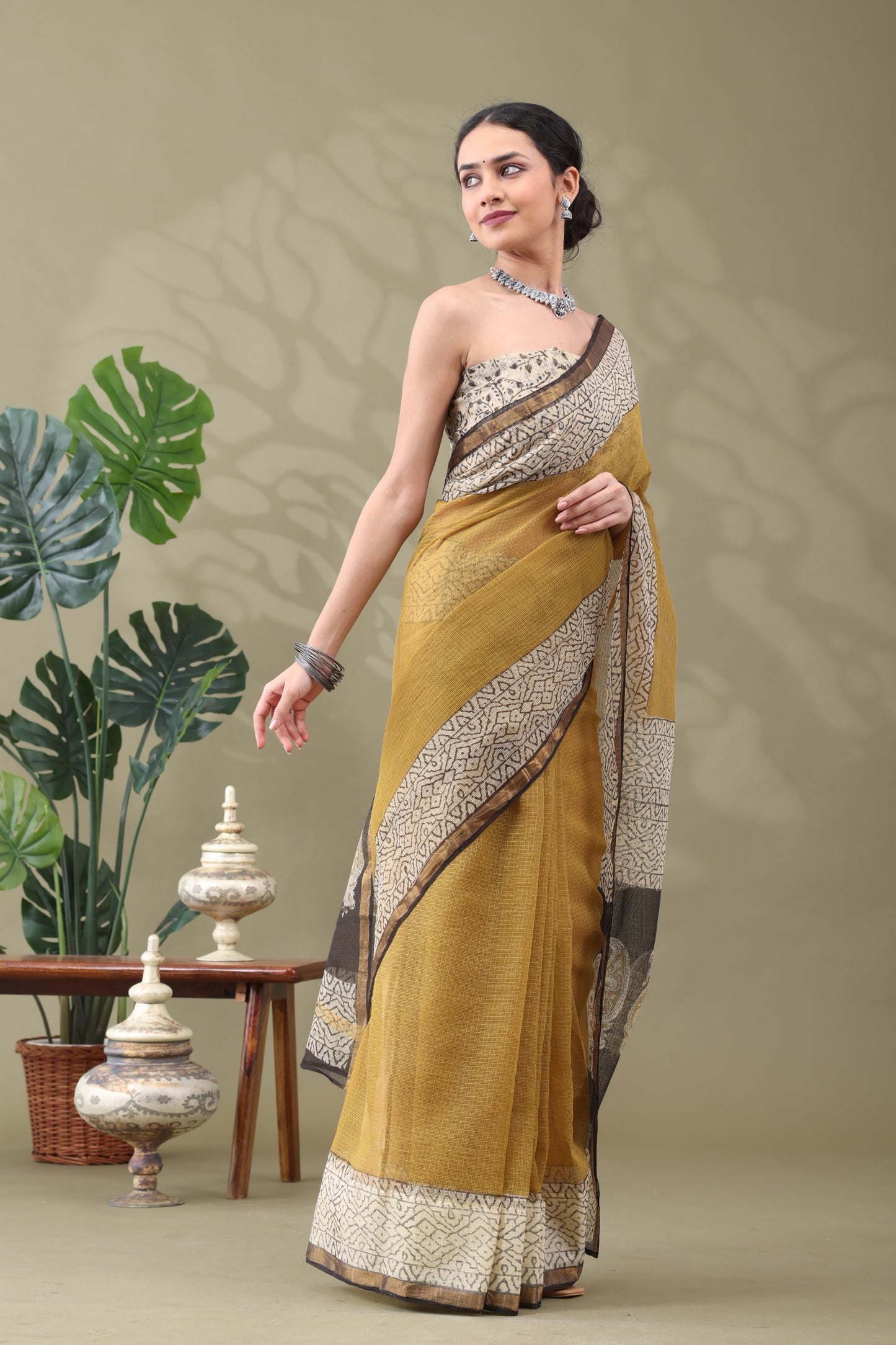 Navya Gold Yellow Geometric Border Cotton Kotta Doriya Saree.